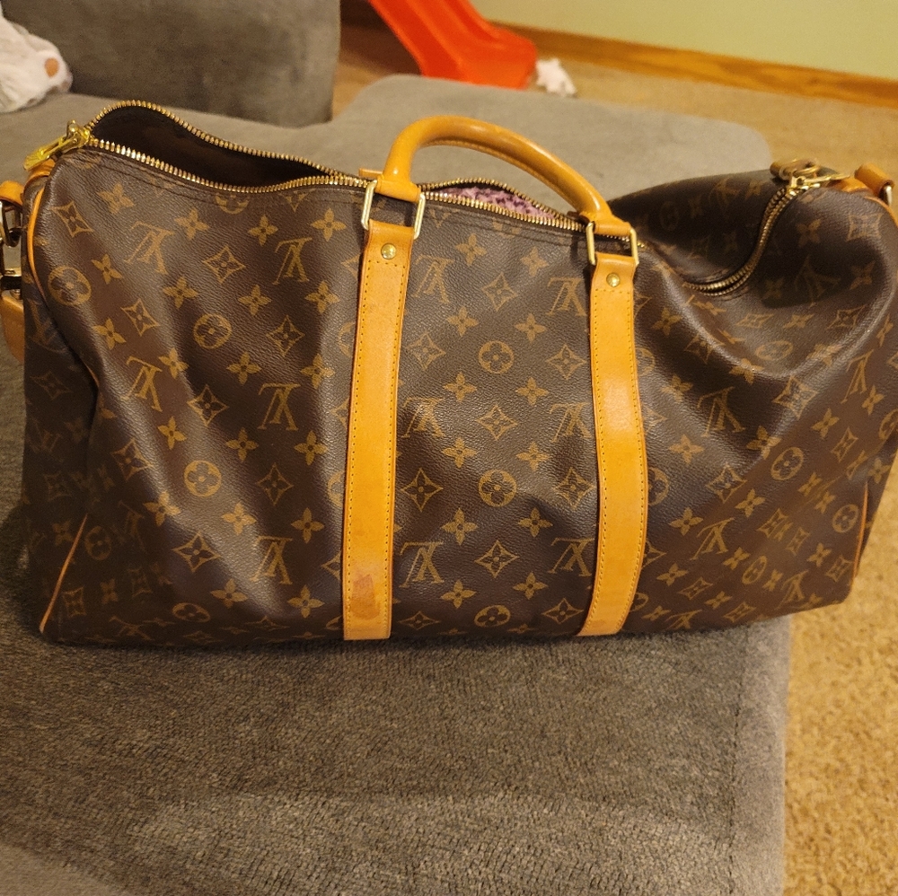 Authentic Louis Vuitton Over Night Bag